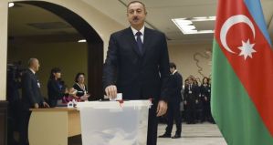 Azerbaijan’s president Ilham Aliyev casts his ballot at a polling station during the parliamentary election in Baku, Azerbaijan.
